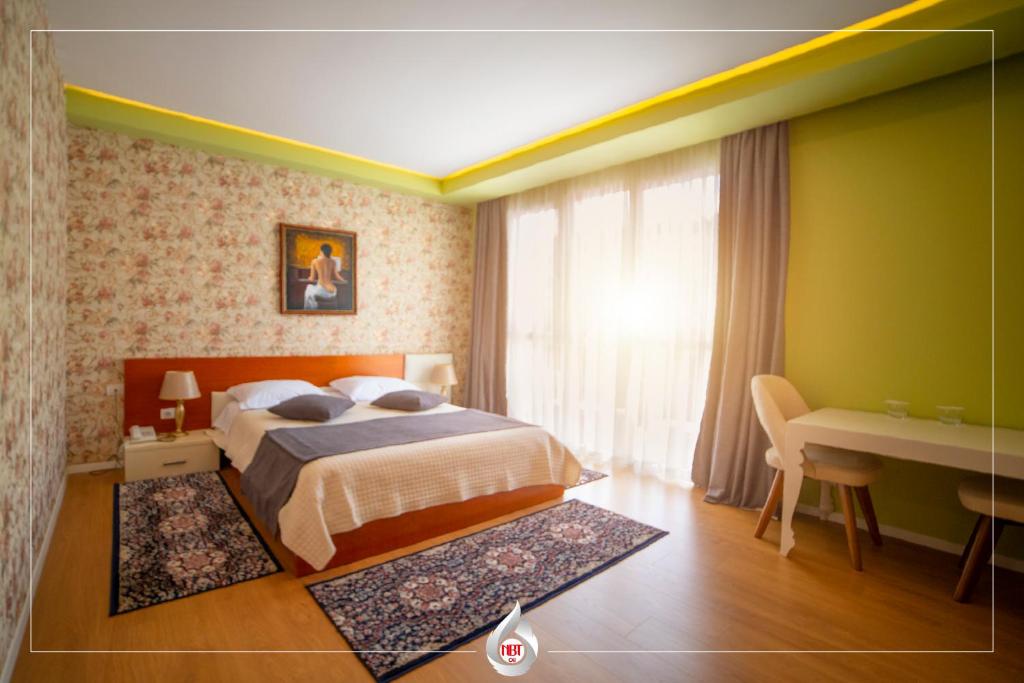 Postel nebo postele na pokoji v ubytování NBT Hotel Reps