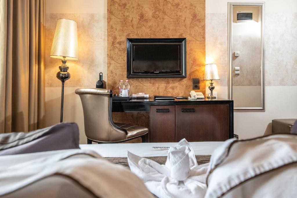 TV a/nebo společenská místnost v ubytování Hotel Délibáb