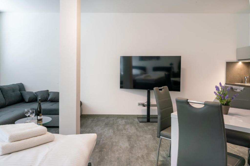 TV a/nebo společenská místnost v ubytování Apartmány Venuše