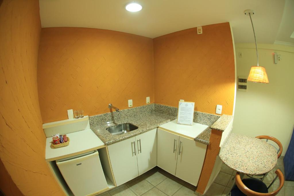 Kuchyň nebo kuchyňský kout v ubytování Garbos Soleil Hotel