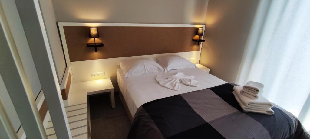 Ein Bett oder Betten in einem Zimmer der Unterkunft Ammouda Villas