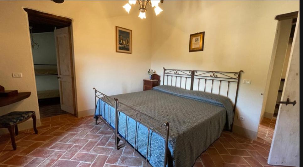 Postel nebo postele na pokoji v ubytování Borgo Chiantina