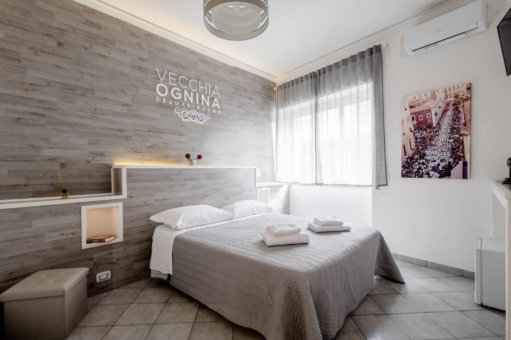 Ένα ή περισσότερα κρεβάτια σε δωμάτιο στο Vecchia Ognina