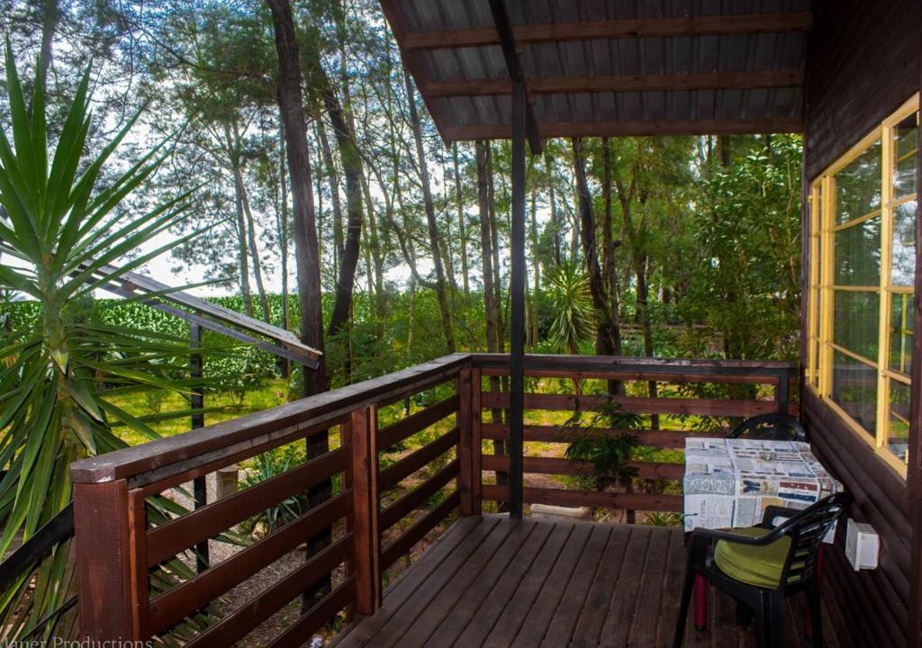 ระเบียงหรือลานระเบียงของ Woodland Gardens Pet Friendly Lodge