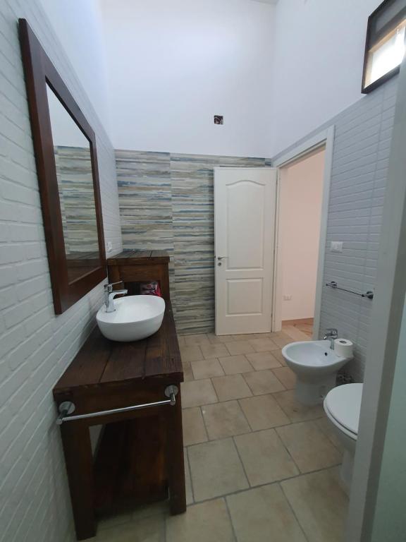 Koupelna v ubytování Lu Salentu Chalet Beach