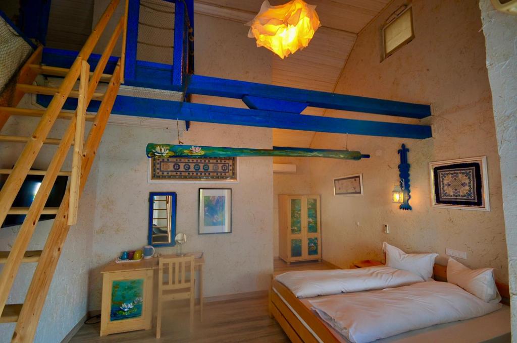Postel nebo postele na pokoji v ubytování Nena Art Resort
