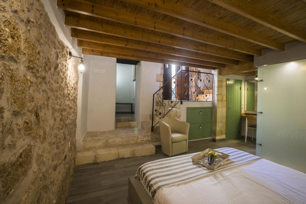 A bed or beds in a room at Eulogia Casa
