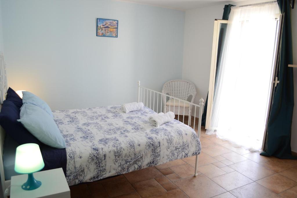 Postel nebo postele na pokoji v ubytování Bella Bari
