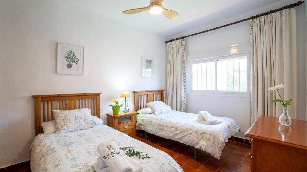 Postel nebo postele na pokoji v ubytování Casa La Pedra Ronda by Ruralidays