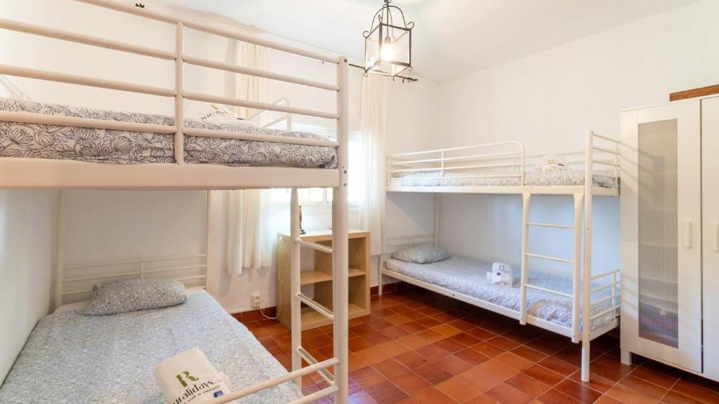 Postel nebo postele na pokoji v ubytování Casa La Pedra Ronda by Ruralidays