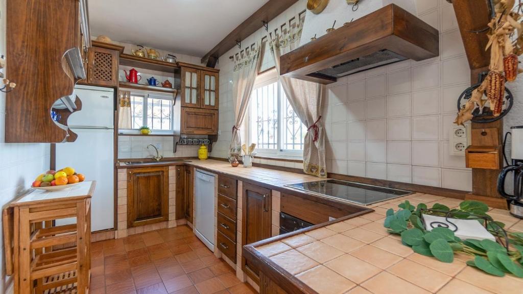 Kuchyň nebo kuchyňský kout v ubytování Casa La Pedra Ronda by Ruralidays