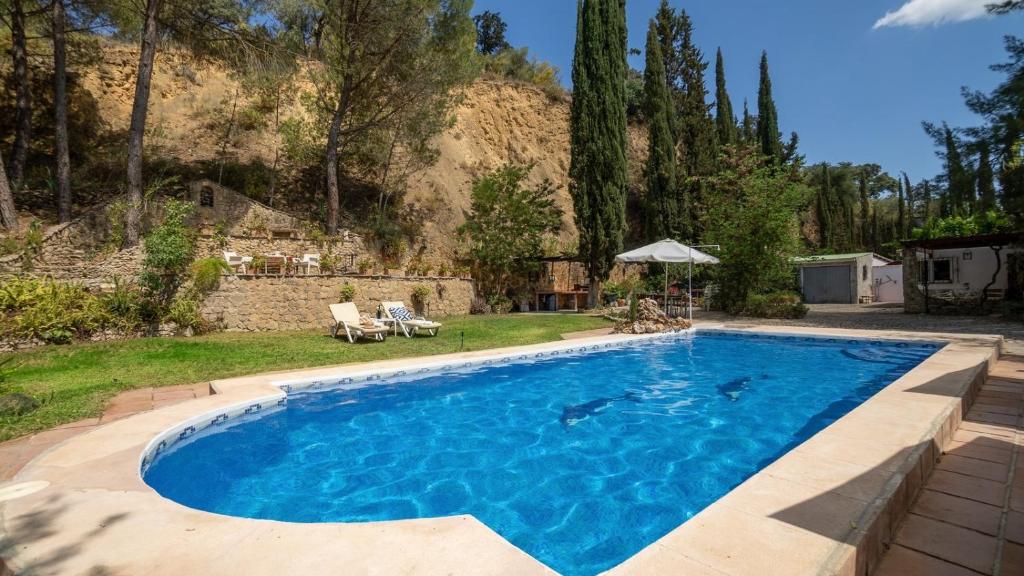 Bazén v ubytování Casa La Pedra Ronda by Ruralidays nebo v jeho okolí