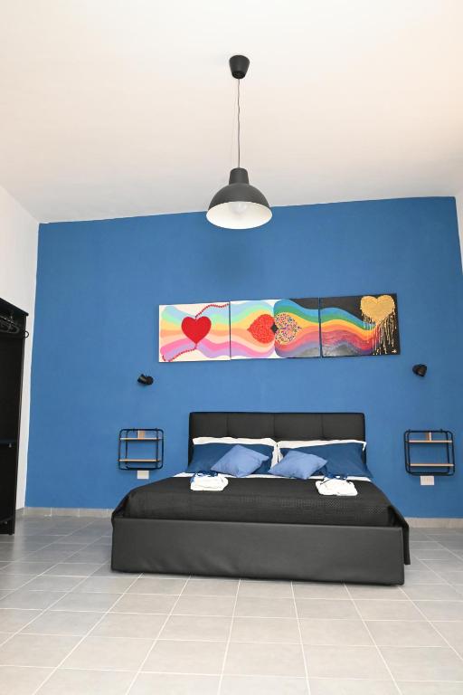 Postel nebo postele na pokoji v ubytování B&B Carlo V - House Hotel