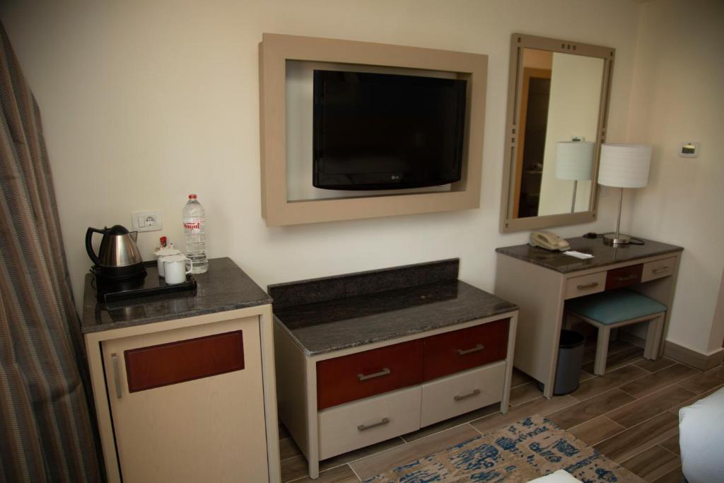 Kuchyň nebo kuchyňský kout v ubytování Swiss Inn Resort Hurghada