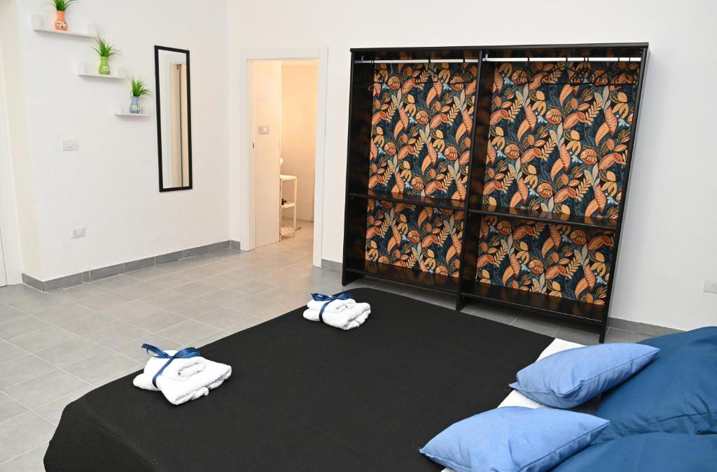 Postel nebo postele na pokoji v ubytování B&B Carlo V - House Hotel
