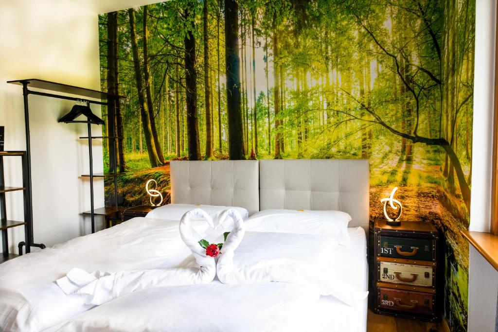 Postel nebo postele na pokoji v ubytování Guesthouse Rosengarten