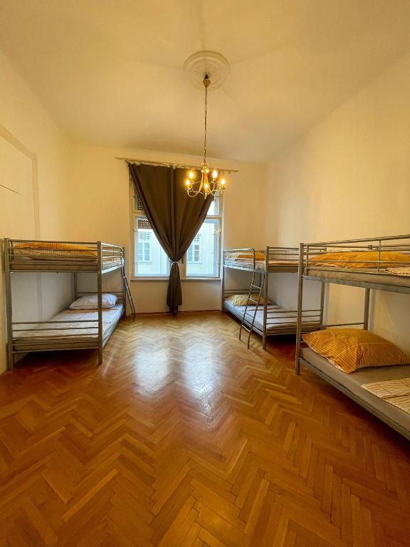 Postel nebo postele na pokoji v ubytování Centrum Hostel