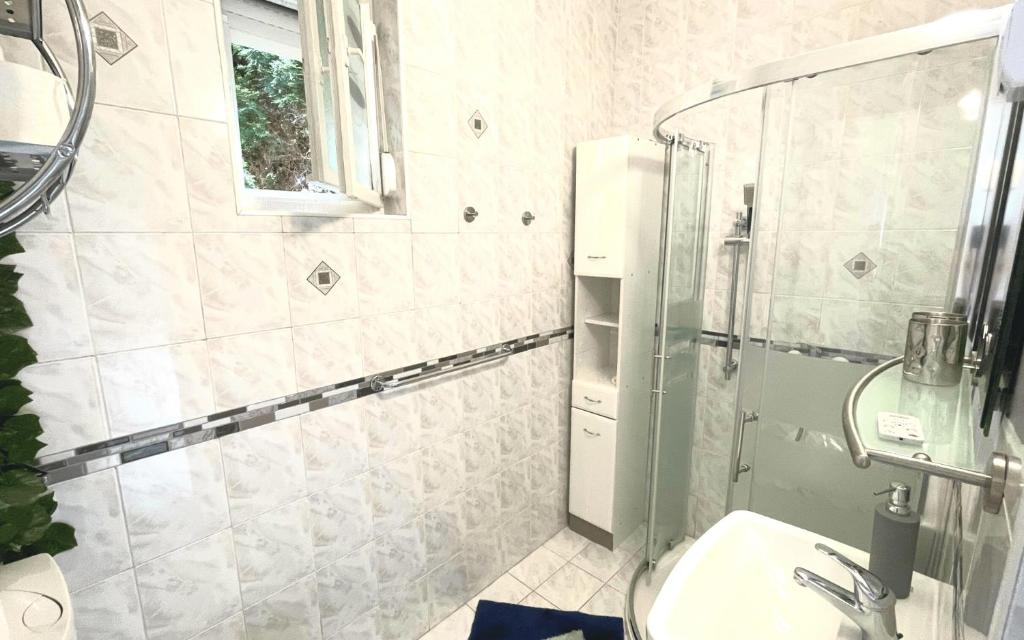 Kúpeľňa v ubytovaní Heilmann Ház