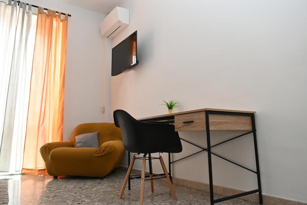 TV a/nebo společenská místnost v ubytování B&B Carlo V - House Hotel