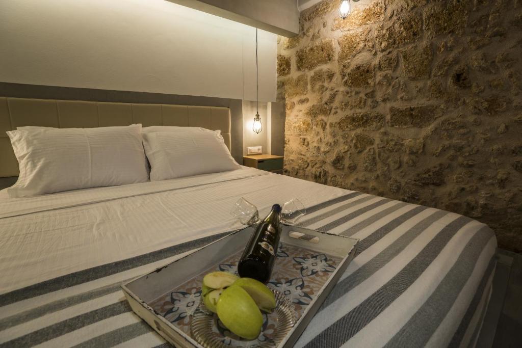 A bed or beds in a room at Eulogia Casa