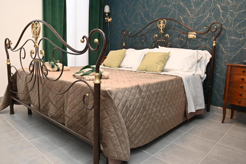 Postel nebo postele na pokoji v ubytování B&B Carlo V - House Hotel