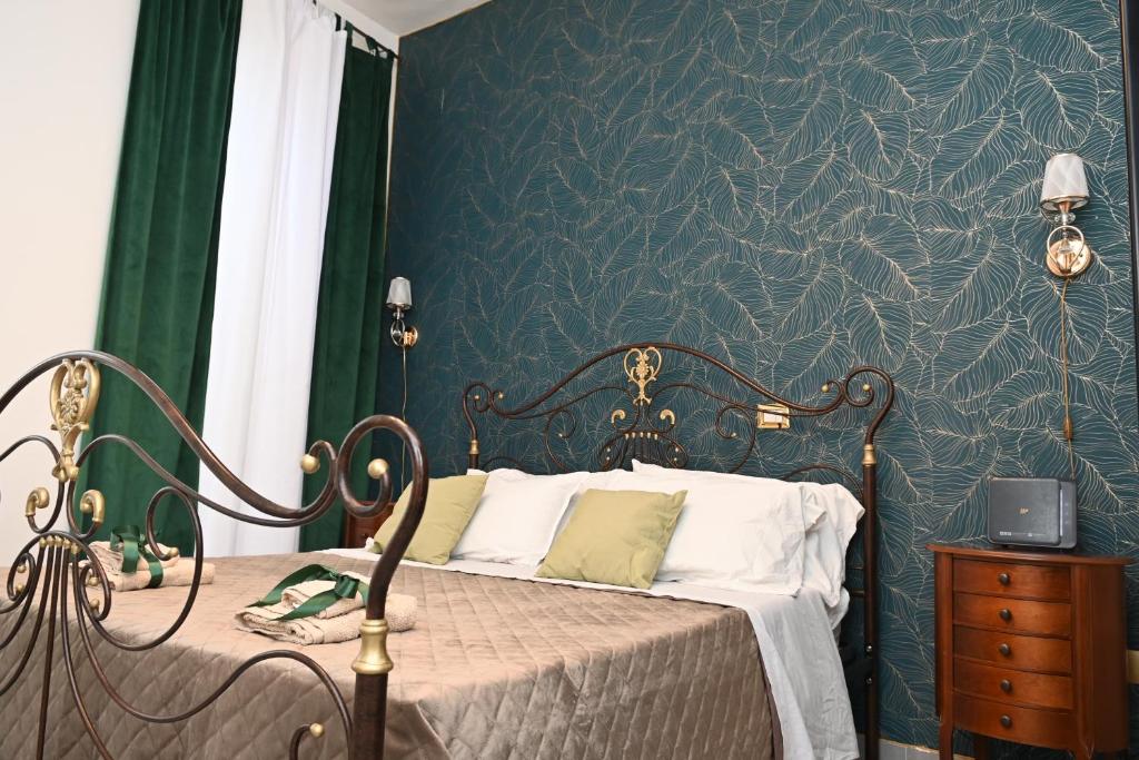 Postel nebo postele na pokoji v ubytování B&B Carlo V - House Hotel