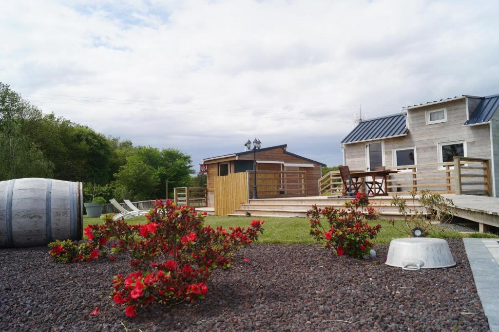 Κήπος έξω από το Bain Nordique SPA - Tiny house à la campagne