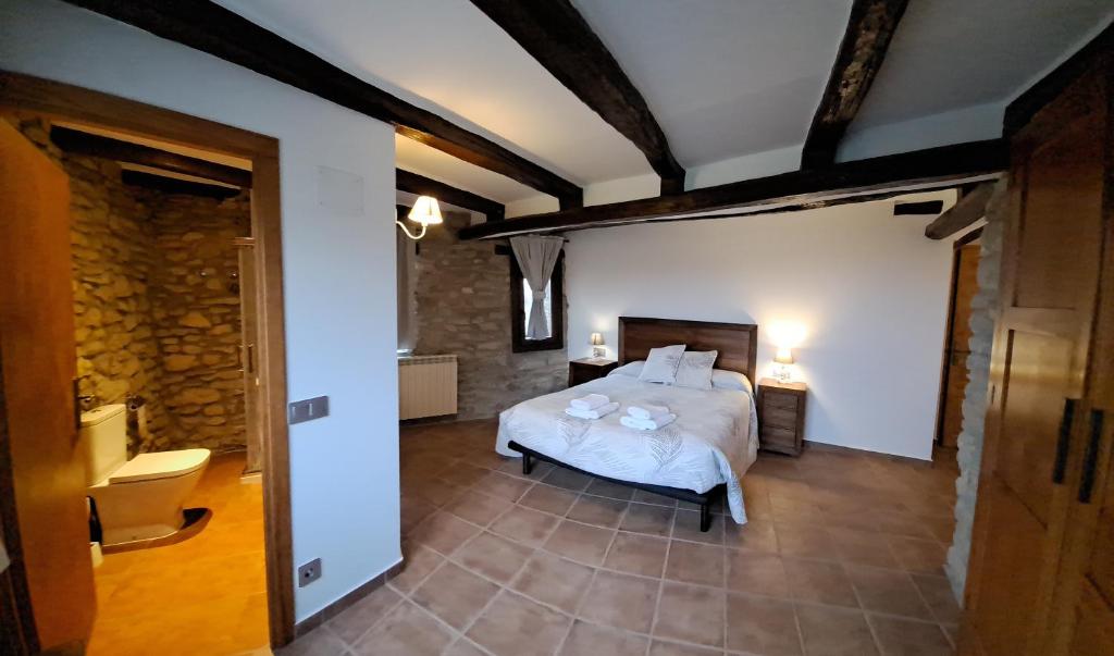 Postel nebo postele na pokoji v ubytování Casa Moliner