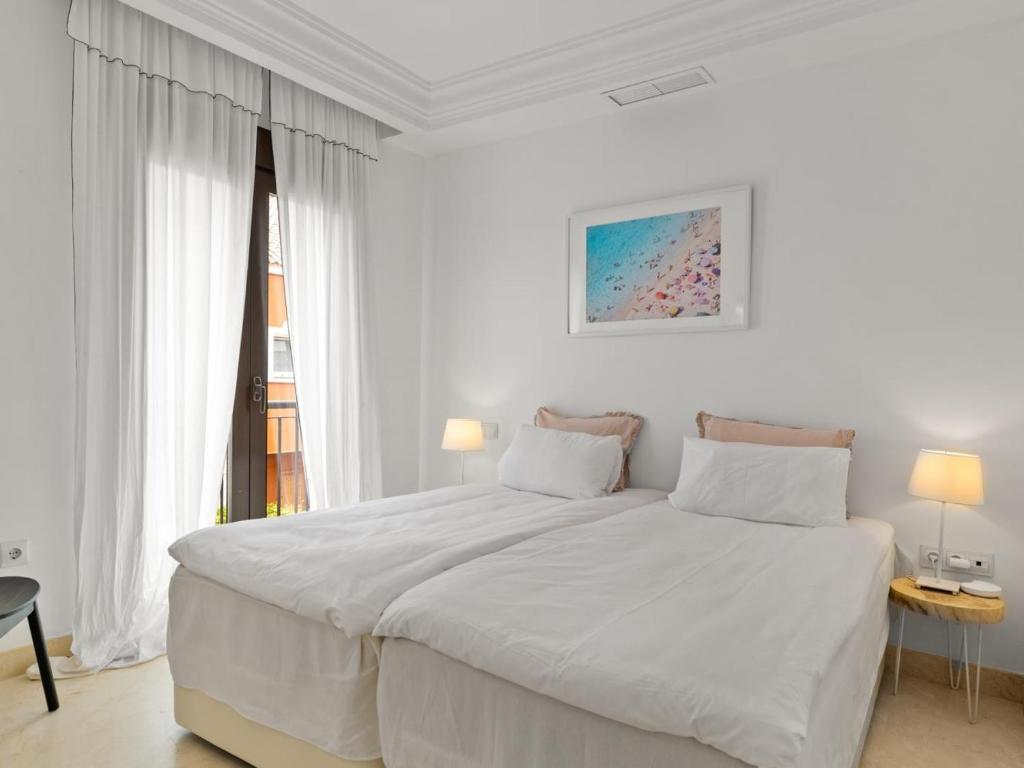 Posteľ alebo postele v izbe v ubytovaní Casa las Salinas