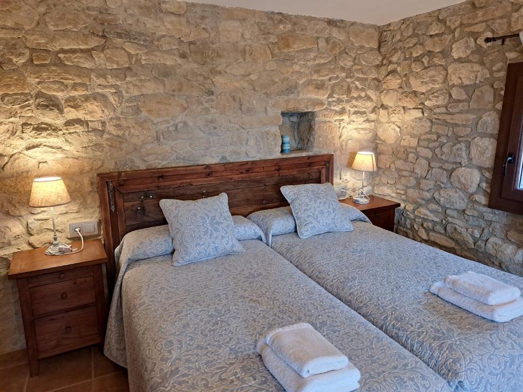 Postel nebo postele na pokoji v ubytování Casa Moliner