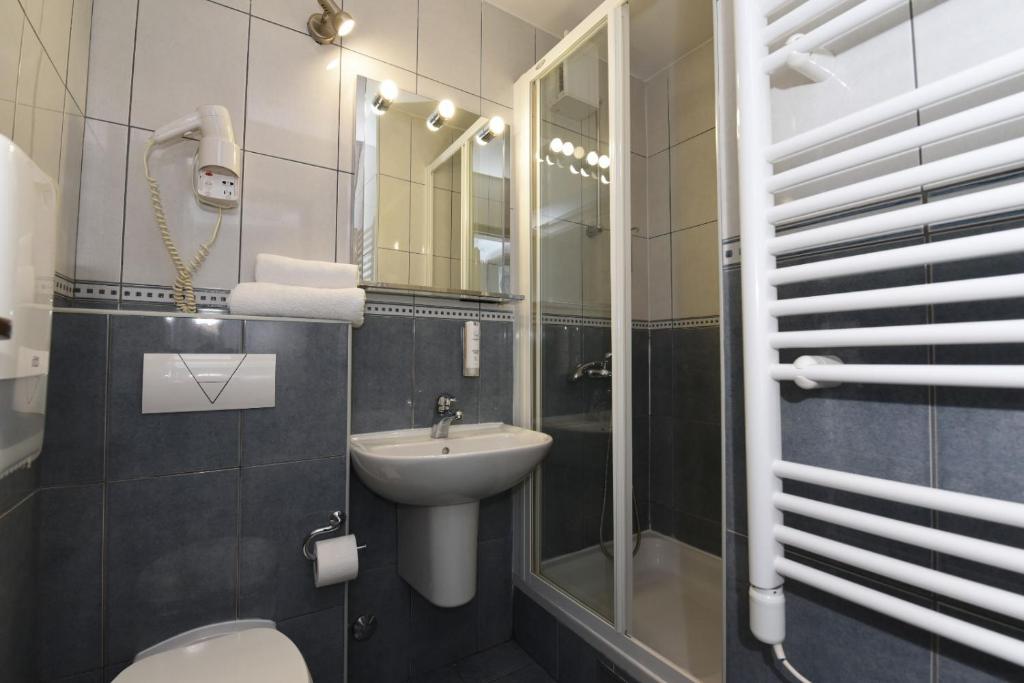 Koupelna v ubytování Hotel Tolero