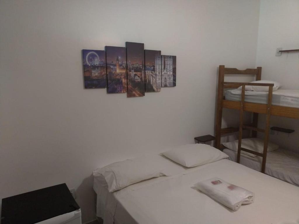Cama ou camas em um quarto em Hope Pousada