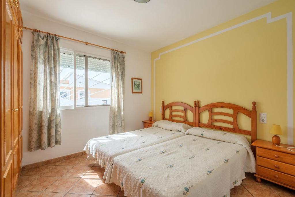 A bed or beds in a room at Marblau 4