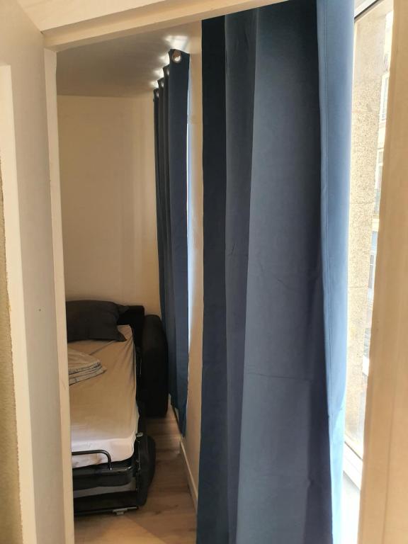 Postel nebo postele na pokoji v ubytování Plat Gousset - RDC