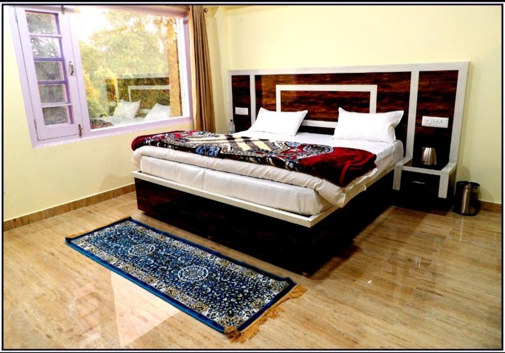 Postel nebo postele na pokoji v ubytování THE HIDEAWAY Homestay Chail