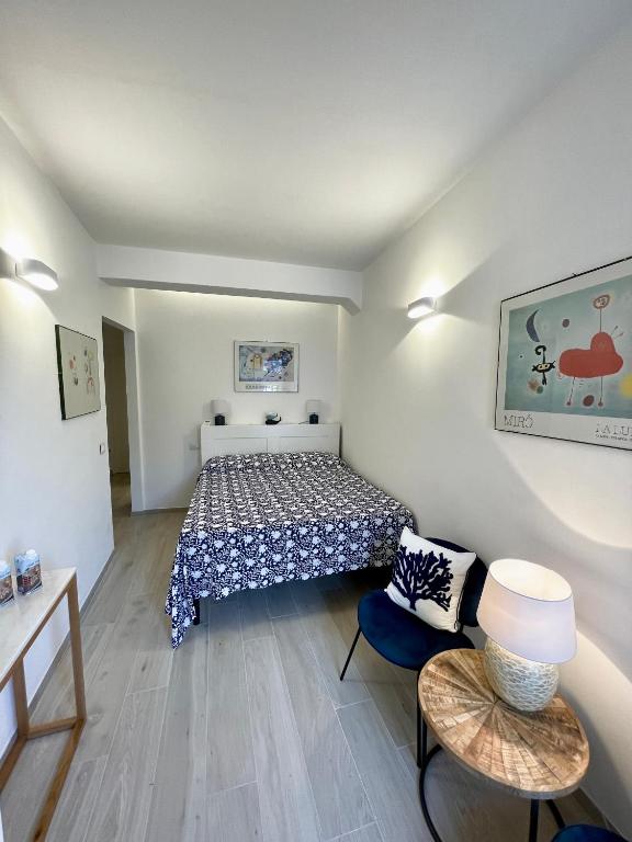 Postel nebo postele na pokoji v ubytování Salty Dreams Manarola