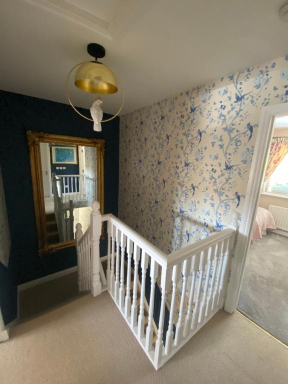 Postel nebo postele na pokoji v ubytování Summer Cottage in Kinsale