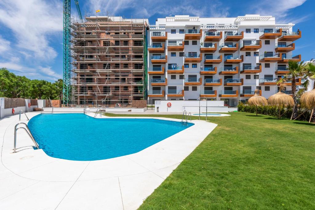 Bazén v ubytovaní Beachfront Apartment 034 alebo v jeho blízkosti