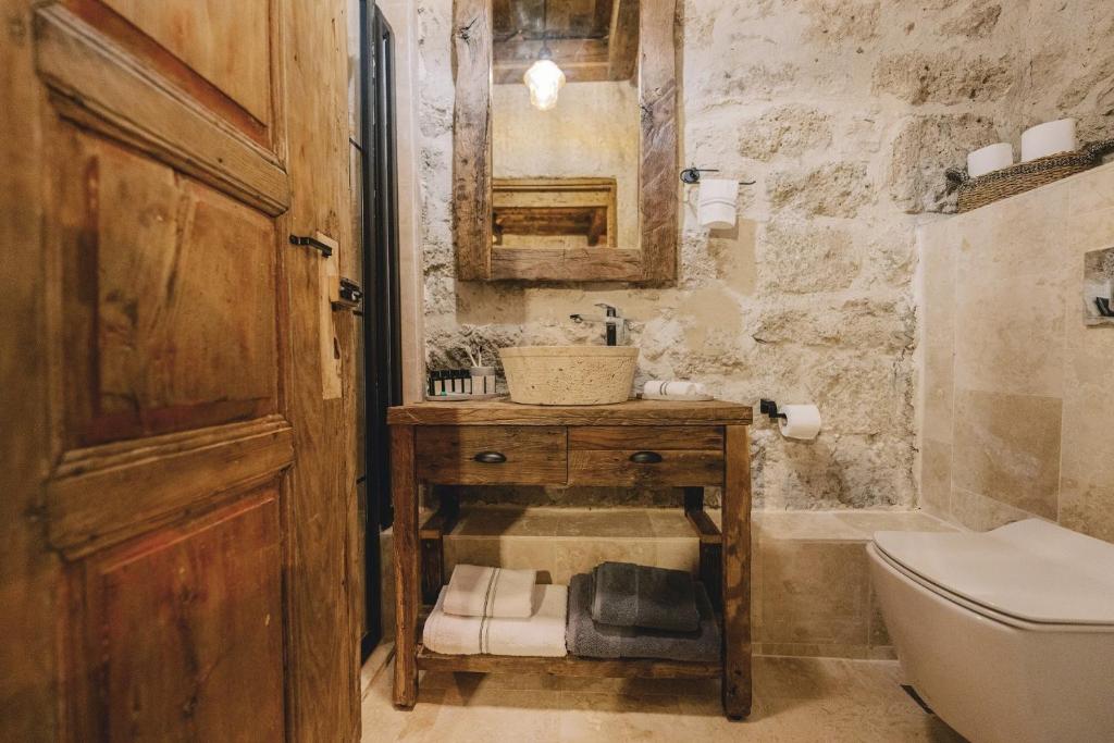 Suare Alaçatı Adults Only - Kamer Met Kingsize Bed En Uitzicht Op Het Zwembad