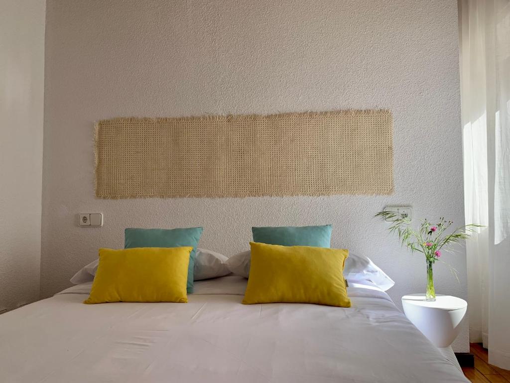 Postel nebo postele na pokoji v ubytování casa loopez Hostel
