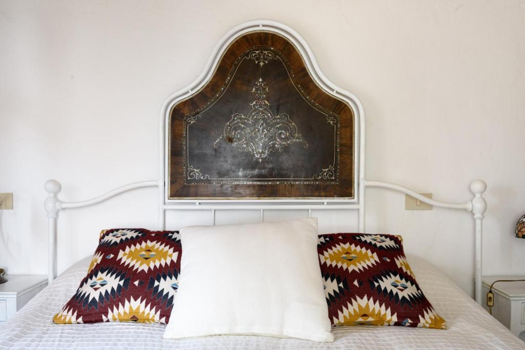 Postel nebo postele na pokoji v ubytování Agriturismo Quarantallina