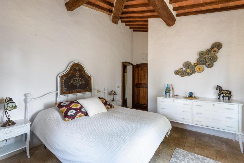 Postel nebo postele na pokoji v ubytování Agriturismo Quarantallina