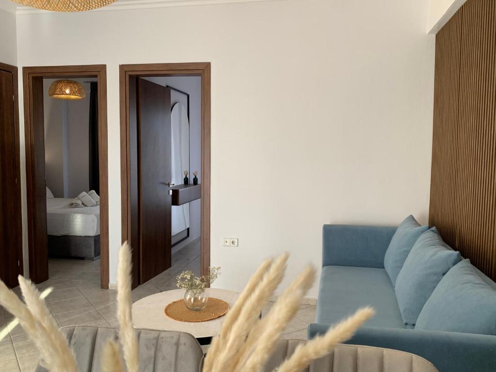 Łóżko lub łóżka w pokoju w obiekcie Vryzas Resort