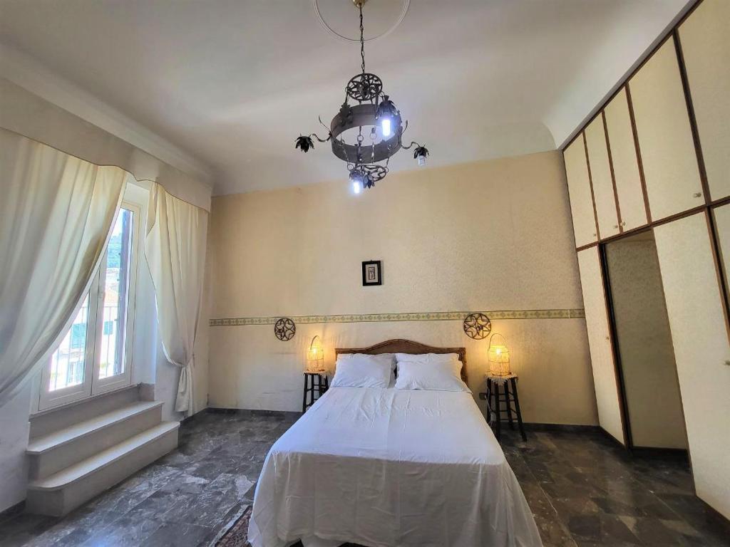 מיטה או מיטות בחדר ב-Appartamenti Kira