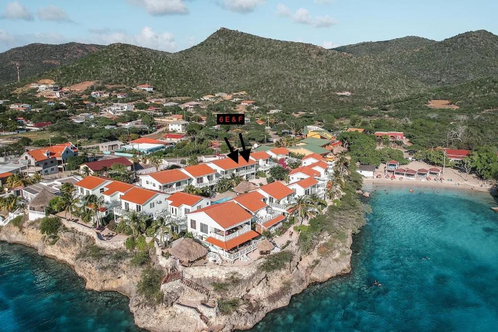 an aerial view of a resort on a rocky island at Lagoon Ocean Resort 2 bdrm/2bath with beach access in Lagun