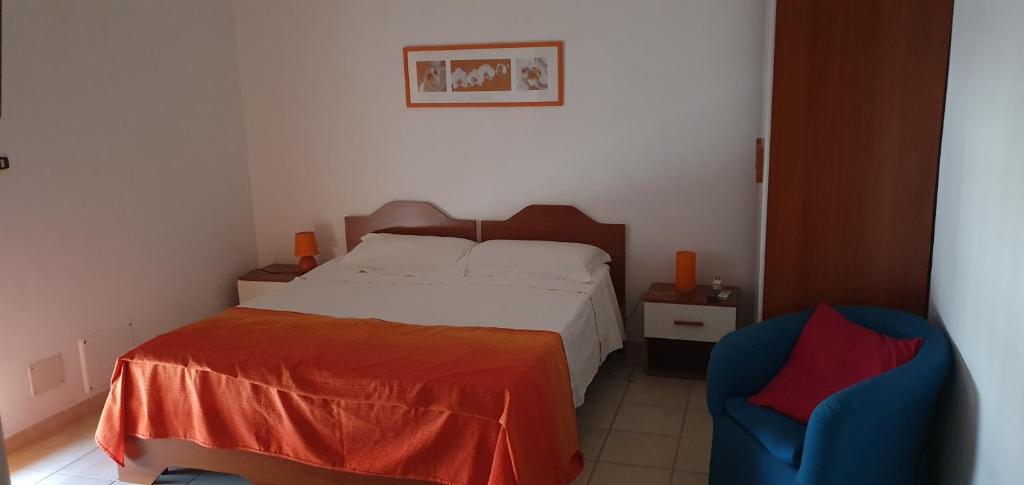 Postel nebo postele na pokoji v ubytování HOME COLUCCI