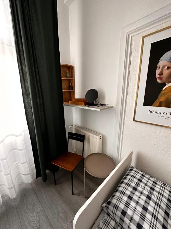 Posteľ alebo postele v izbe v ubytovaní Centrum ARTLwowska