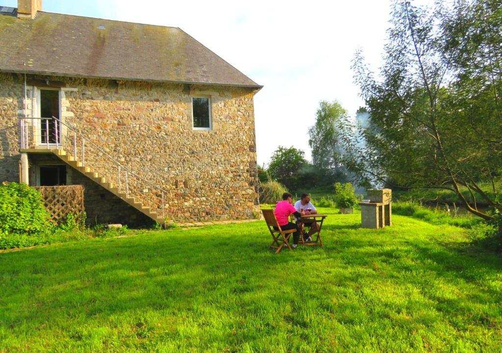 Zahrada ubytování Domaine La Synchronicité - Gîte et Chambres d'Hôtes