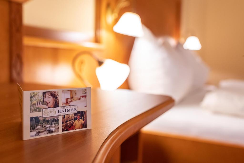 Postel nebo postele na pokoji v ubytování Genießerhof Haimer - Hotel Garni
