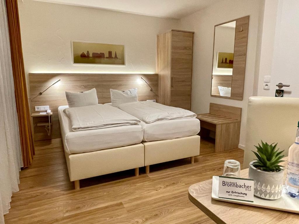 Katil atau katil-katil dalam bilik di Hotel Bronnbacher Hof